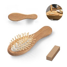 Wooden hairbrush with round bamboo bristles